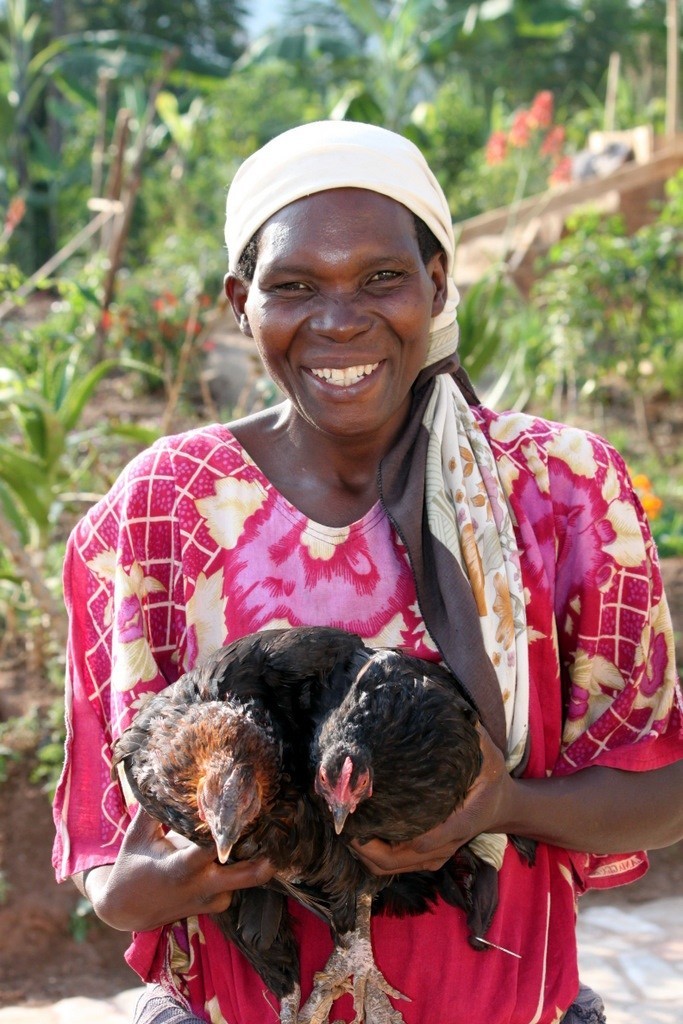 With-Two-New-Chickens-683x1024